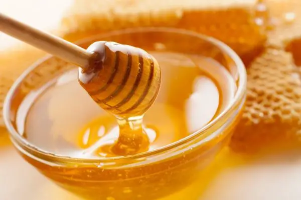 raw honey in a bowl