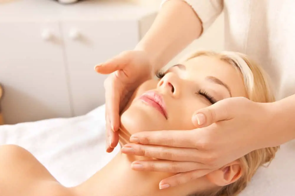 girl getting face massage for glowing skin naturally at home