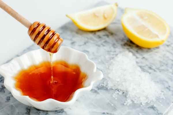 honey being used in a diy acne treatment
